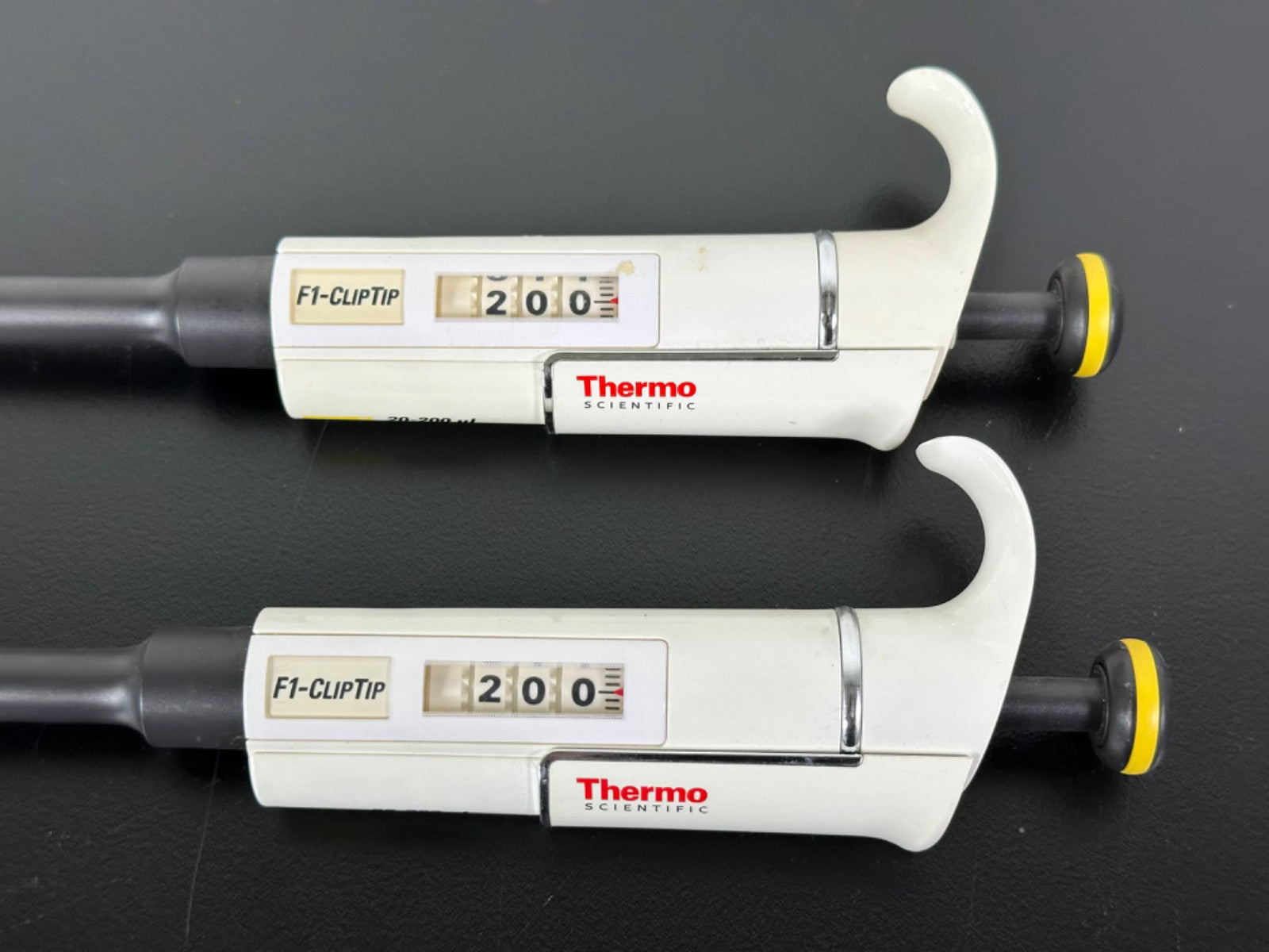 Lot of 2 Thermo Scientific F1 ClipTip 20 200uL Adjustable Pipettes1