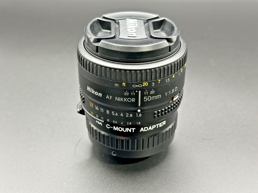 Nikon AF Nikkor 50mm f/1.8D Prime Lens w/ NA C Mount Adapter0
