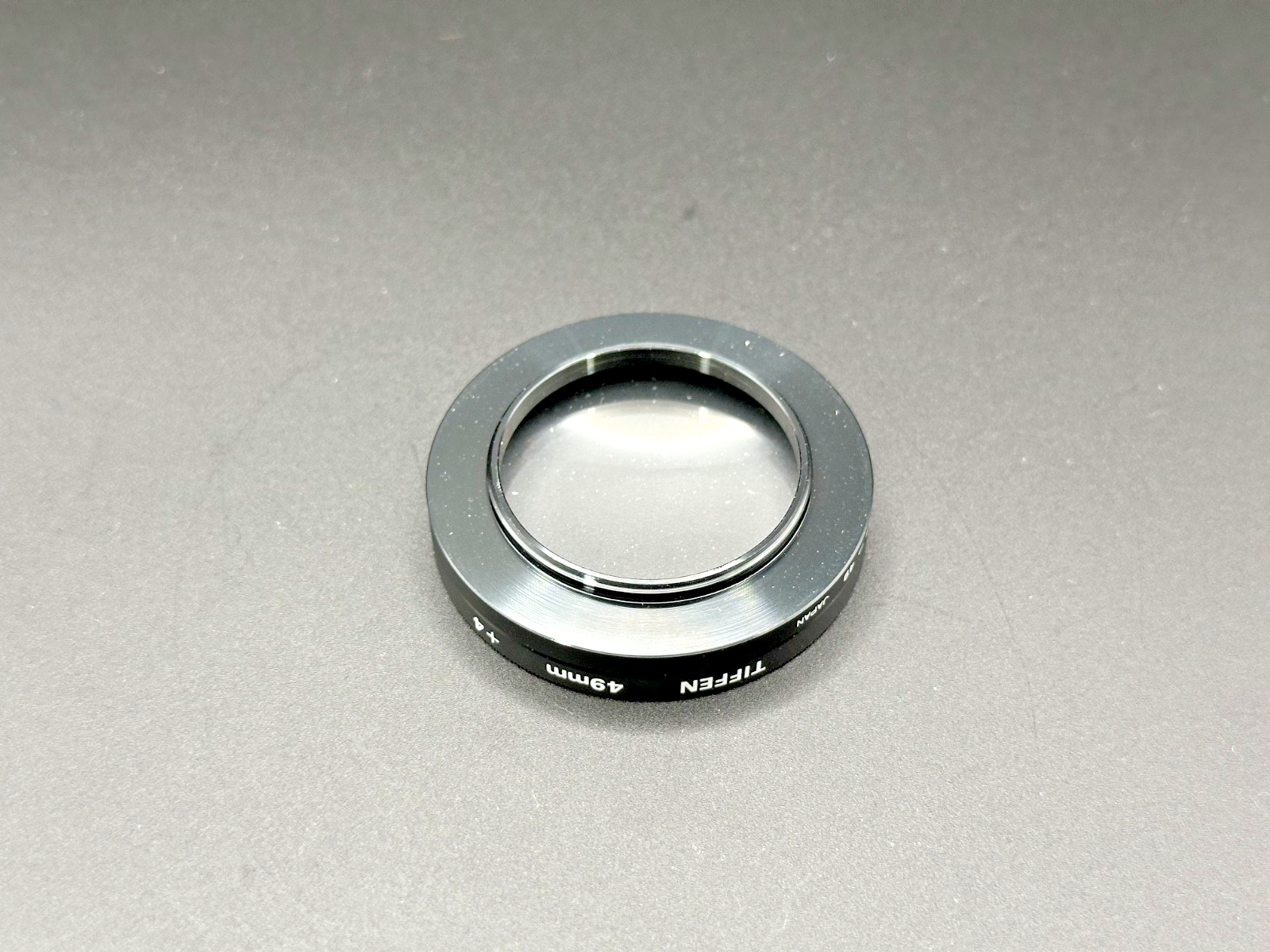 Tiffen 49mm +4 Close Up Macro Lens Filter w/ 37 49mm Step Up Ring Case3