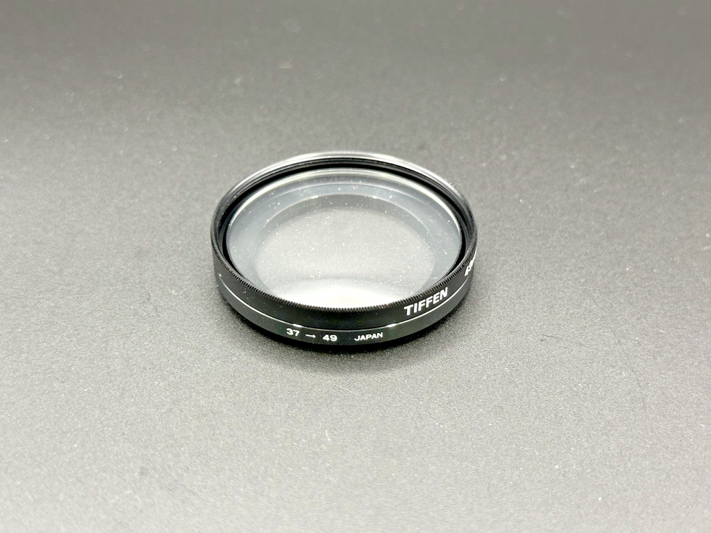Tiffen 49mm +4 Close Up Macro Lens Filter w/ 37 49mm Step Up Ring Case2