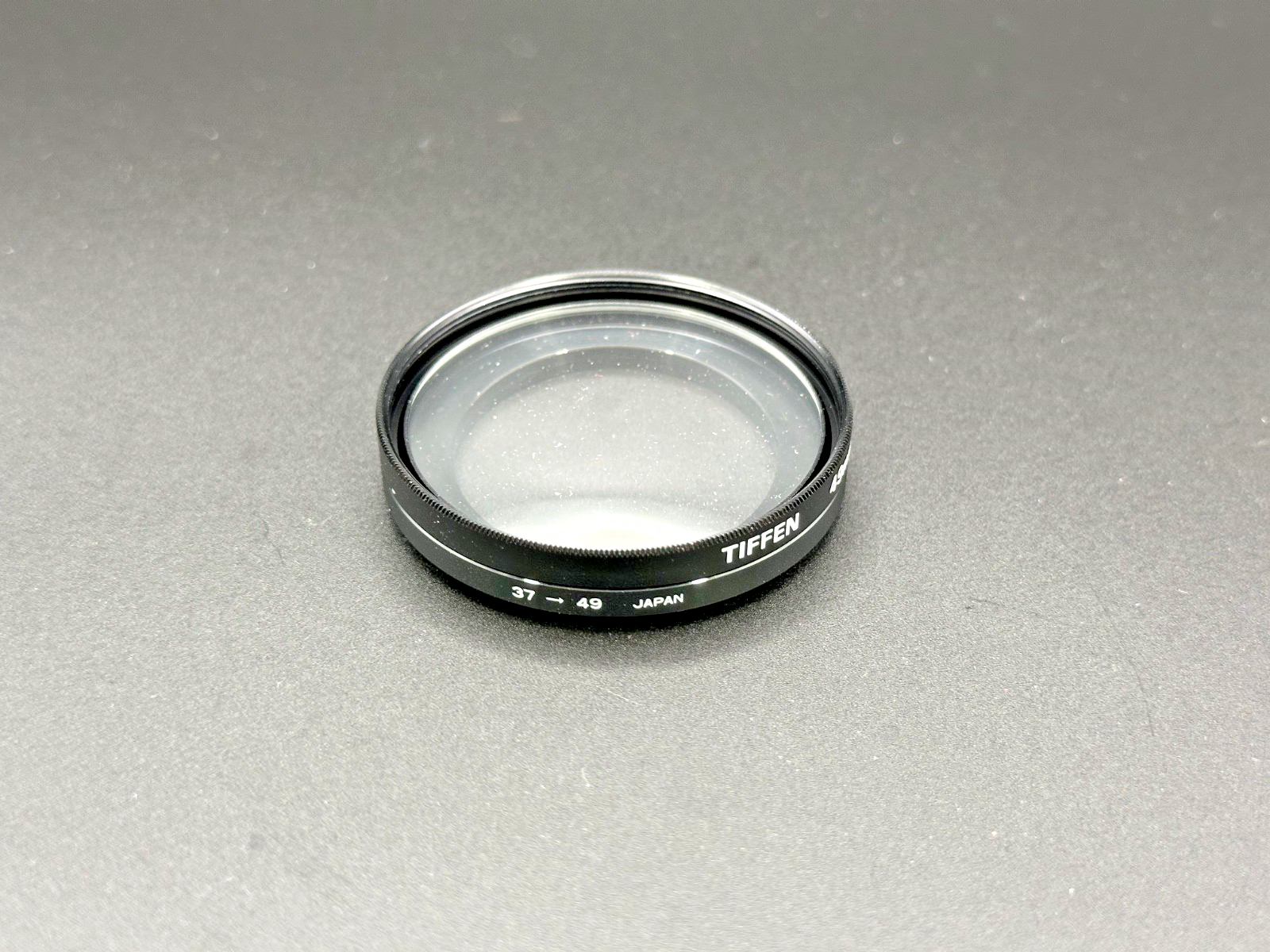 Tiffen 49mm +4 Close Up Macro Lens Filter w/ 37 49mm Step Up Ring Case2