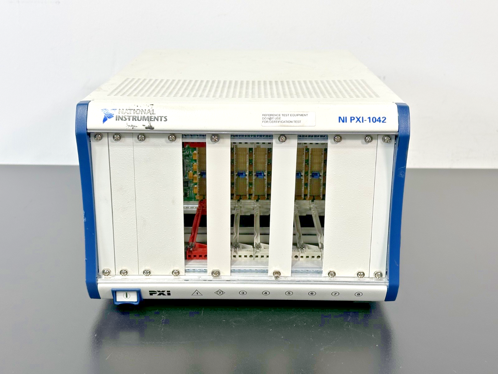 National Instruments NI PXI 1042 8 Slot 3U PXI Chassis 188129D 01 Used Powers On0